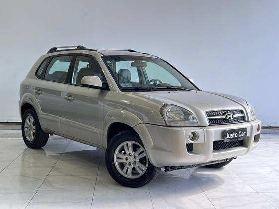 HYUNDAI TUCSON 2.0 MPFI GL 16V 142CV 2WD GASOLINA 4P AUTOMÁTICO HYUNDAI TUCSON 2.0 MPFI GL 16V 142CV 2WD GASOLINA 4P AUTOMÁTICO